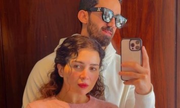 مي عز الدين و زوجها 